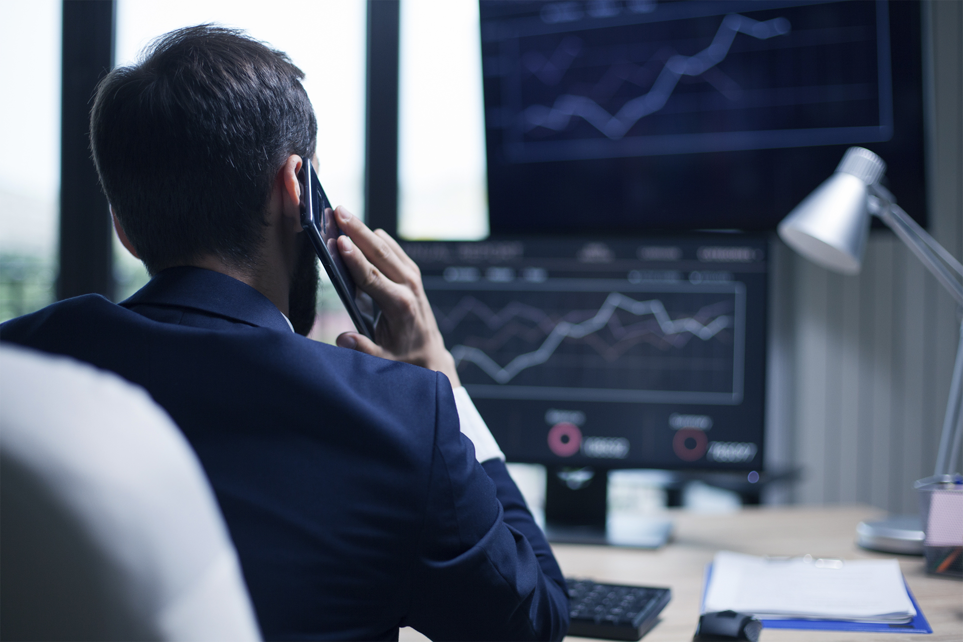 Trader analyzes trading costs